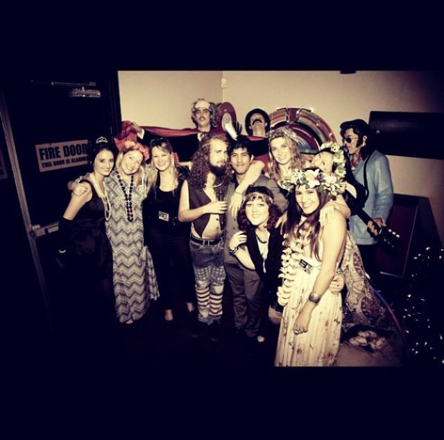 AIM fundraising team photo from "Memories and Melodies"--all dressed in the music nostalgia theme.