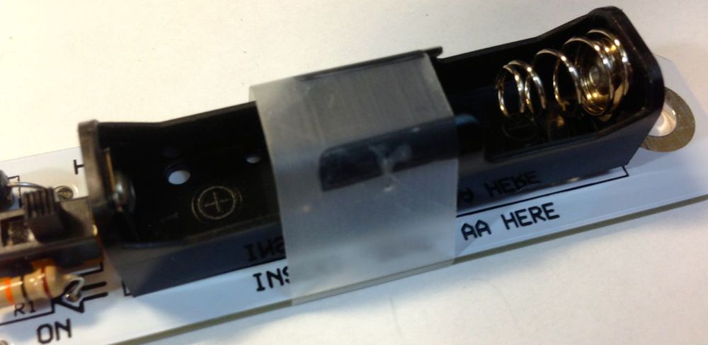 Hint: Use tape to hold the battery holder in place while soldering.