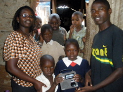 Serah Regan and Children Serah Mucha of World Corps Kenya with teacher Reagan and students of St. Catherine School.